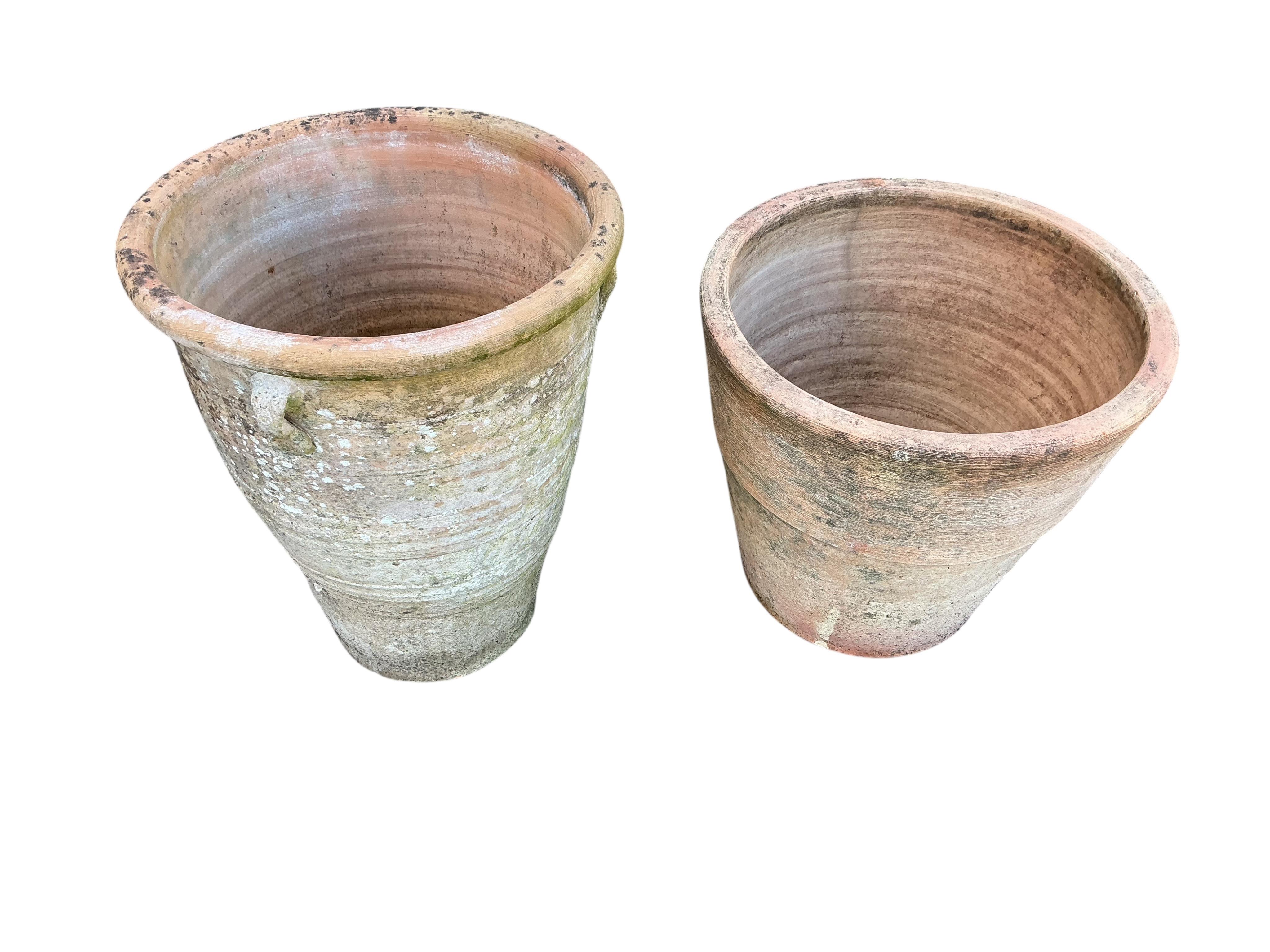 Four circular terracotta garden planters including a Sankey Bulwell pot, largest diameter 40cm, height 36cm
